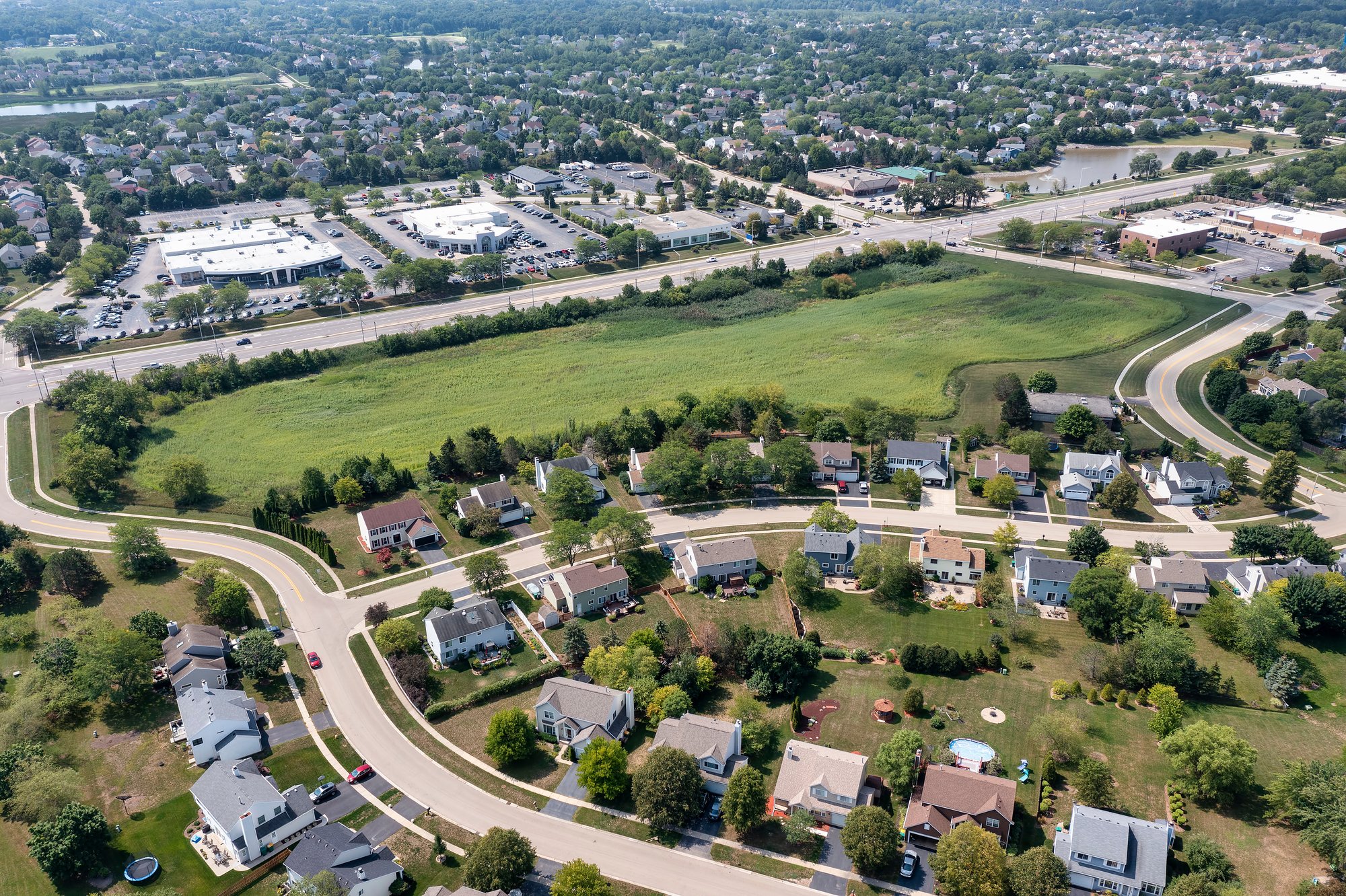 Suburban aerial view representing land title data migration and modernization