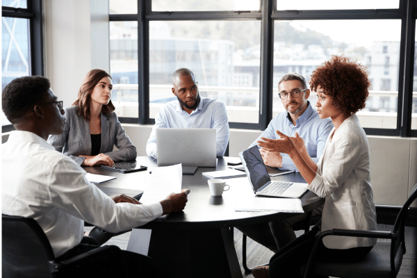 GIS professionals assessing spatial data and planning system workflows