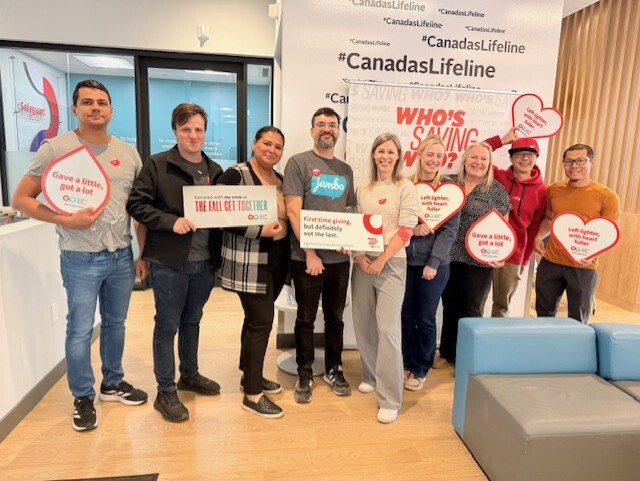 MNC team members posing together at a Canadian Blood Services blood donation event