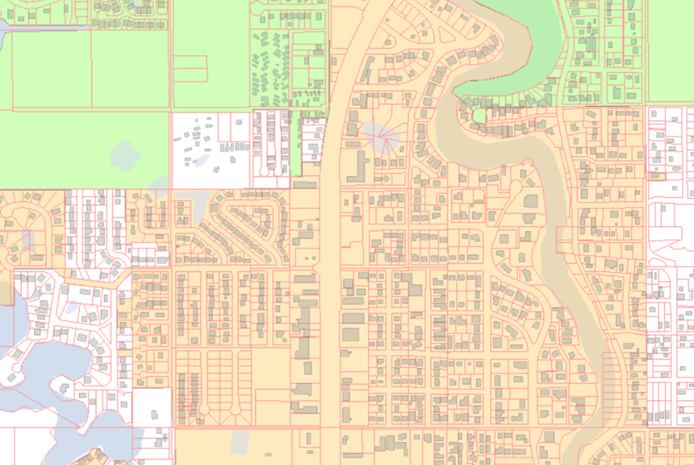 Parcel map showing property boundaries, roads, waterways, and land parcels within a developed community