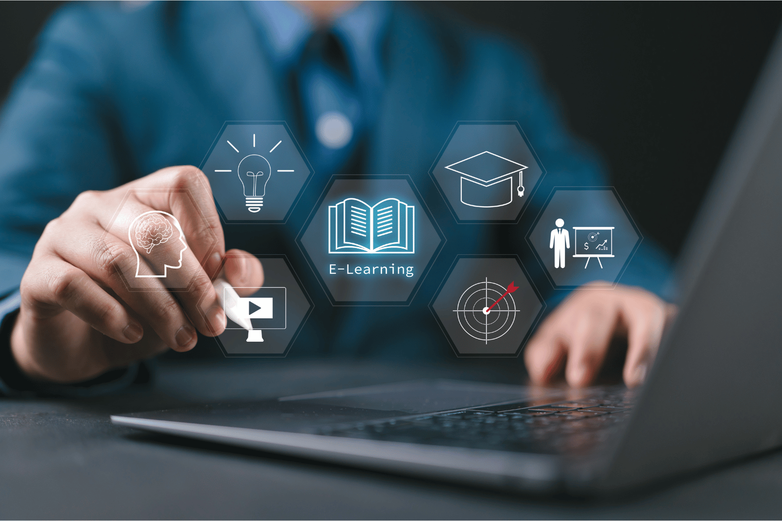 Person interacting with a laptop and virtual e-learning icons, including education and training symbols.