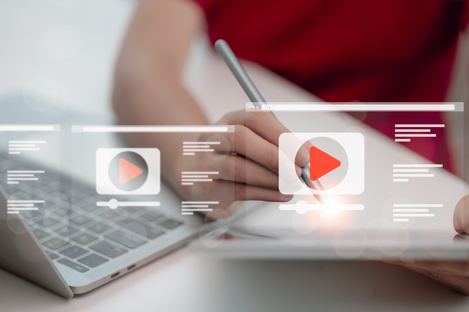 Person accessing video content on a laptop and tablet representing MNC's online video library